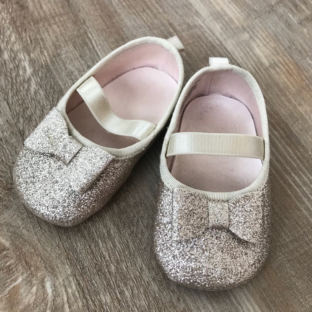 A pair of infant shoes.